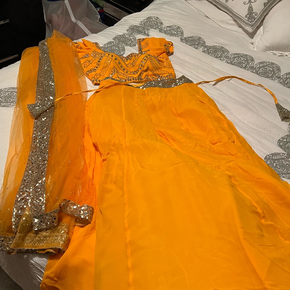 Burnt orange lehenga with silver